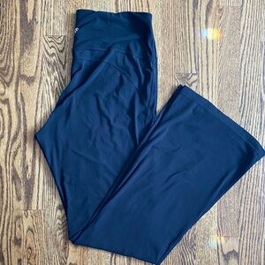 Black Groove Nulu high rise flare leggings, size 12. Great condition, one hole